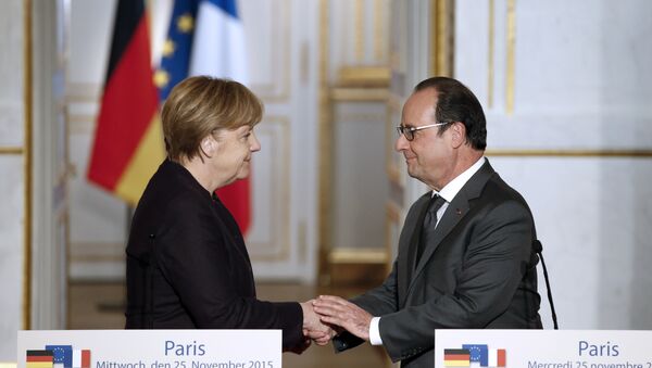 François Hollande et Angela Merkel - Sputnik Afrique
