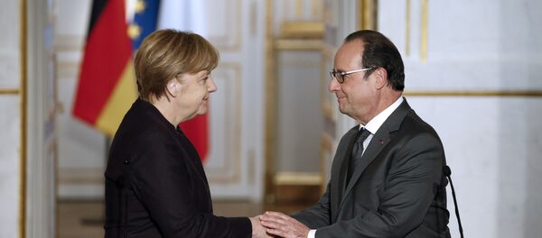 François Hollande et Angela Merkel - Sputnik Afrique