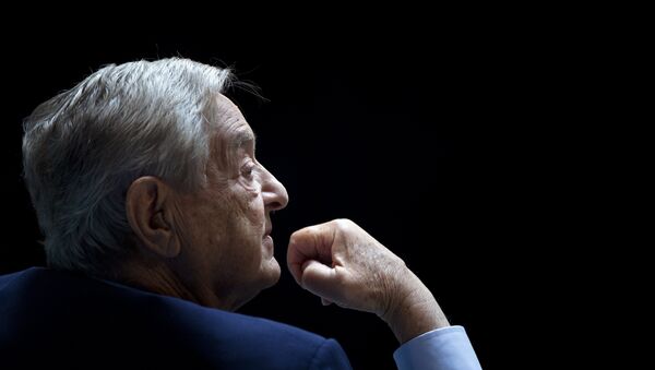 George Soros, Chairman of Soros Fund Management, listens during a seminar titled Charting A New Growth Path for the Euro Zone at the annual International Monetary Fund and World Bank meetings September 24, 2011 in Washington, DC. - Sputnik Afrique
