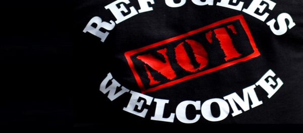 Une affiche contre l'immigration - Sputnik Afrique