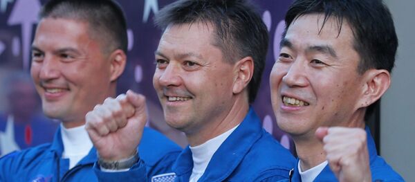 Le cosmonaute russe Oleg Kononenko et les astronautes américain Kjell Norwood Lindgren et japonais Kimiya Yui - Sputnik Afrique