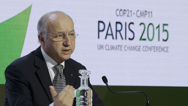 Laurent Fabius présente le projet d'accord final sur le climat à la COP21 - Sputnik Afrique