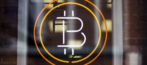 Un signe de Bitcoin - Sputnik Afrique