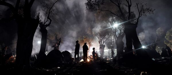 migrants - Sputnik Afrique