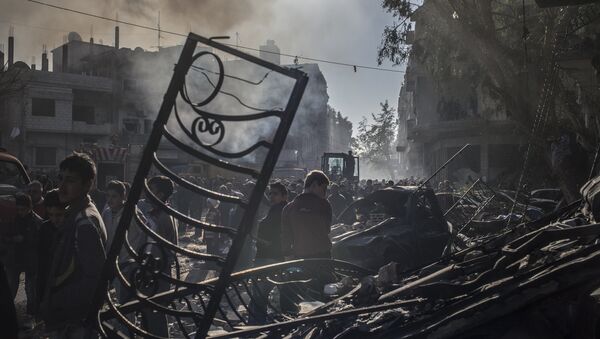 résidents de Homs, site de l'attentat terroriste dans le centre-ville - Sputnik Afrique