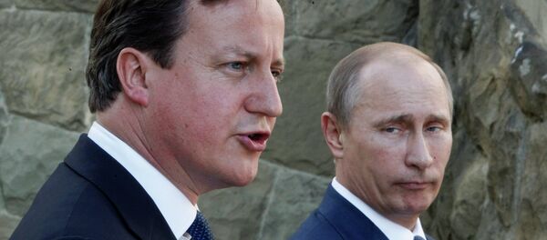 Le président russe Vladimir Poutine et le prémier-ministre britannique David Cameron - Sputnik Afrique