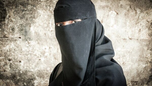 Une femme portant le niqab - Sputnik Afrique