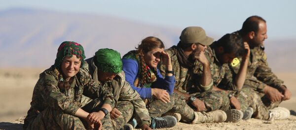 Kurdish fighters from the People's Protection Units - Sputnik Afrique