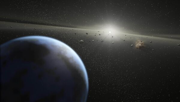 This artist's rendition released 20 April, 2005 by NASA shows a massive asteroid belt in orbit around a star the same age and size as our Sun - Sputnik Afrique