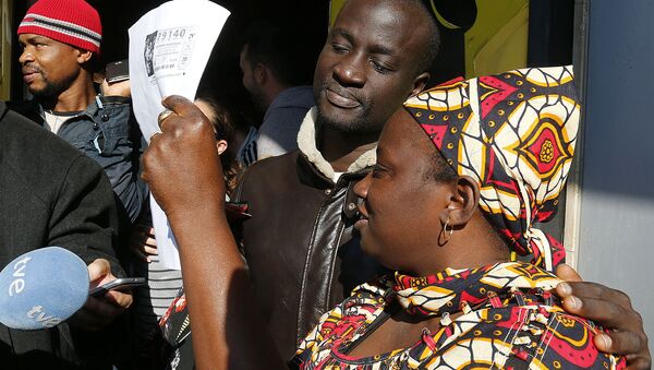 Un réfugié sénégalais gagne 400.000 euros à la loterie espagnole - Sputnik Afrique