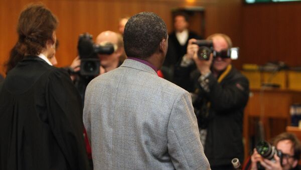 Ancien maire rwandais arrive au tribunal. Archive photo - Sputnik Afrique