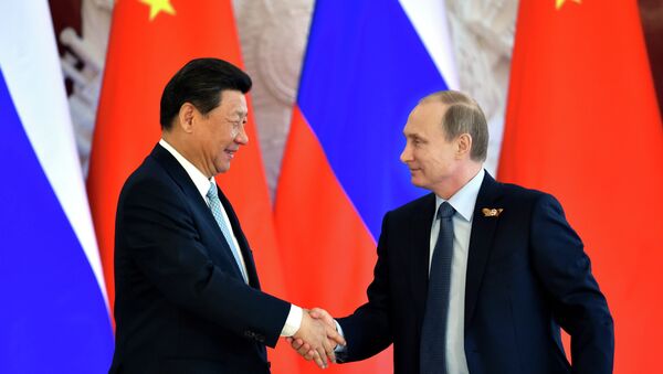Le président russe Vladimir Poutine et le président chinois Xi Jinping - Sputnik Afrique