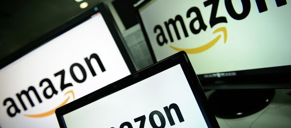 A picture shows the logo of the online retailer Amazon dispalyed on computer screens in London on December 11, 2014 - Sputnik Afrique