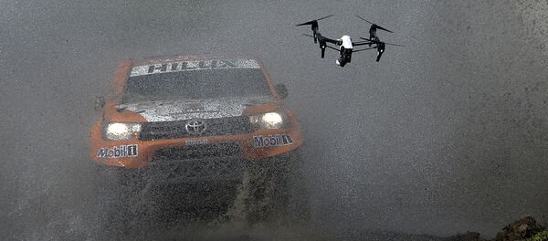 Toyota's driver Ronan Chabot of France and co-driver Gilles Pillot compete during the 11km Prologue of the 2016 Dakar Rally, in the province of Buenos Aires, on January 2, 2016 Toyota's driver Ronan Chabot of France and co-driver Gilles Pillot compete during the 11km Prologue of the 2016 Dakar Rally, in the province of Buenos Aires, on January 2, 2016 - Sputnik Afrique