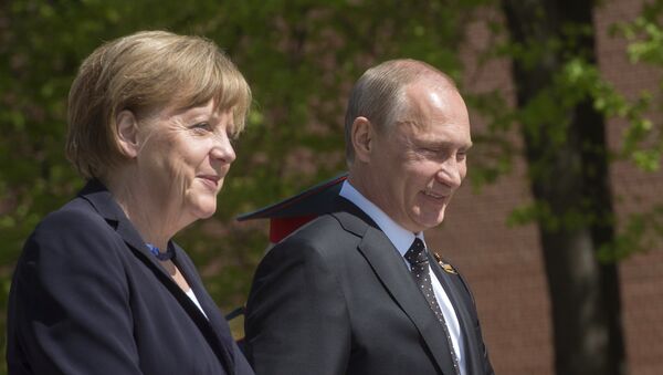 Angela Merkel et Vladimir Poutine. Archive photo - Sputnik Afrique
