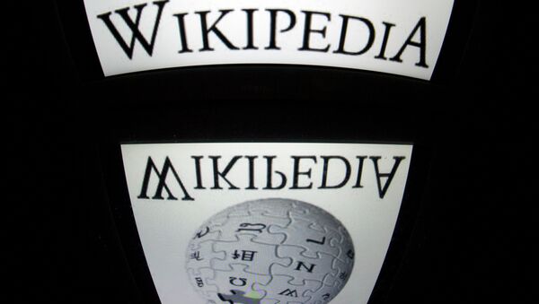 The Wikipedia logo is seen on a tablet screen on December 4, 2012 in Paris - Sputnik Afrique