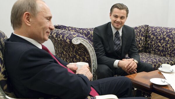 Léonardo di Caprio et Vladimir Poutine à Saint-Pétersbourg - Sputnik Afrique