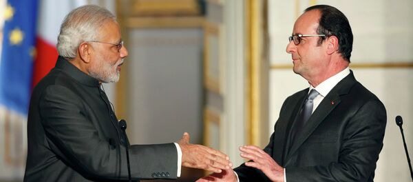 Le premier ministre de l'Inde Narendra Modi et présidente de France Francois Hollande - Sputnik Afrique