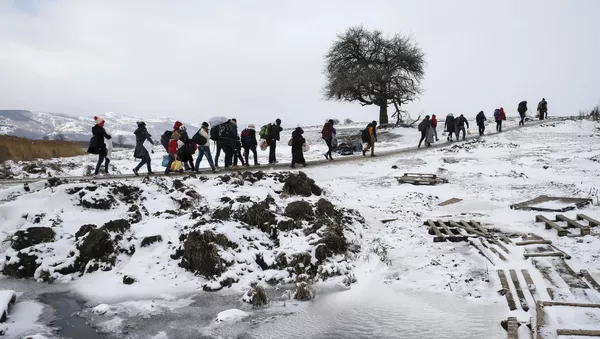 migrants - Sputnik Afrique