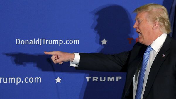U.S. Republican presidential candidate Donald Trump takes the stage at a campaign rally in Windham, New Hampshire, January 11, 2016 - Sputnik Afrique