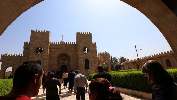 Les chrétiens irakiens vont à l'église Saint-Joseph à Arbil, la capitale de la région autonome kurde, le 6 Août, 2015 - Sputnik Afrique