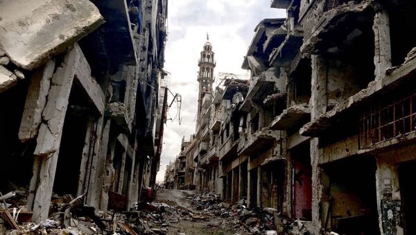 Des ruines dans la ville de Homs. Archive photo - Sputnik Afrique