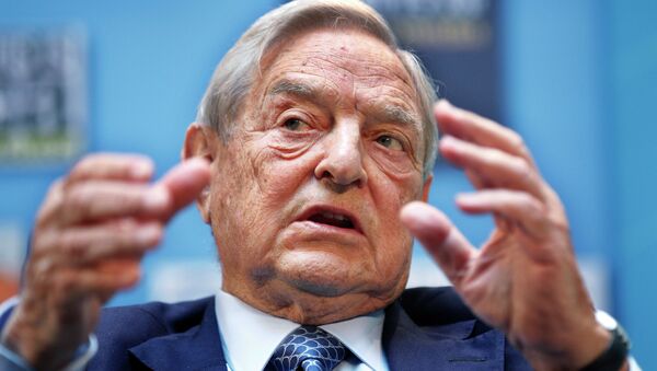 Geroge Soros, long an advocate of imposing more taxes on the wealthy, has himself amassed a massive fortune by delaying those very tax payments - but the bill may be about to come due. - Sputnik Afrique