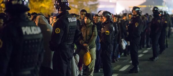 Des migrants - Sputnik Afrique