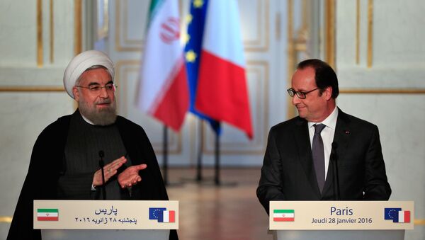 président iranien Hassan Rohani et François Hollande - Sputnik Afrique