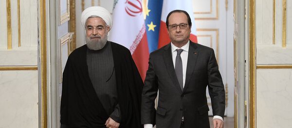 président iranien Hassan Rohani et François Hollande - Sputnik Afrique