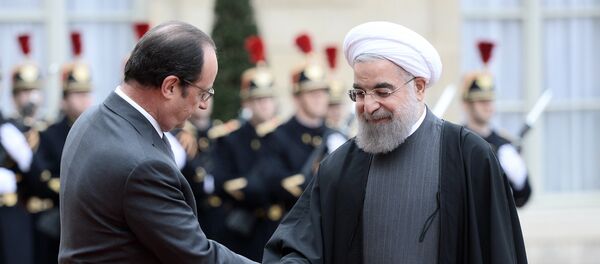 président iranien Hassan Rohani et François Hollande - Sputnik Afrique