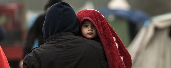 Migrants dans un camp. - Sputnik Afrique
