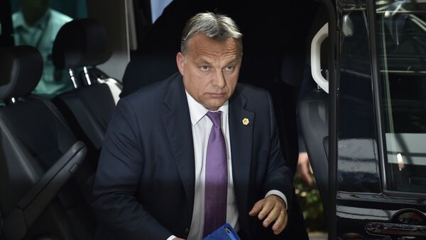 Hungarian Prime Minister Viktor Orban arrives for an EU summit at the EU Headquarters in Brussels on June 25, 2015 - Sputnik Afrique