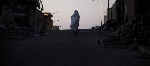 Une femme libyenne à Syrte - Sputnik Afrique