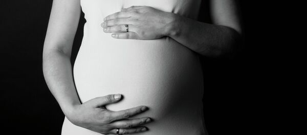 une femme enceinte - Sputnik Afrique