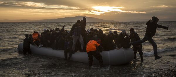 Des migrants - Sputnik Afrique