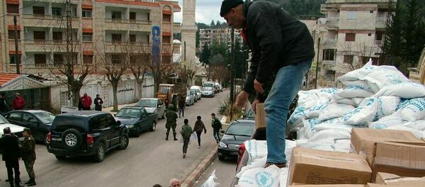 Aide humanitaire russe en Syrie - Sputnik Afrique