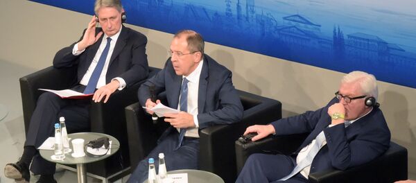 Philip Hammond, Sergueï Lavrov et Frank-Walter Steinmeier - Sputnik Afrique