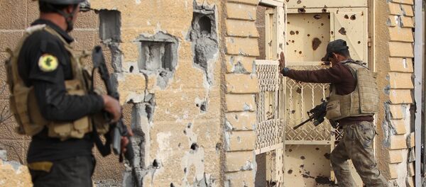 Members of Iraq's elite counter-terrorism service secure on December 27, 2015 the Hoz neighbourhood in central Ramadi, the capital of Iraq's Anbar province, about 110 kilometers west of Baghdad, - Sputnik Afrique