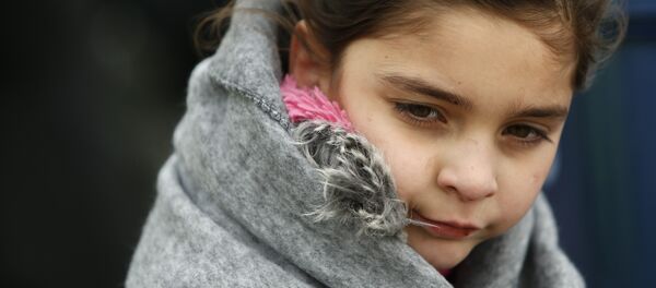 Une fille migrant - Sputnik Afrique