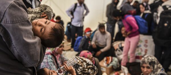 Des migrants - Sputnik Afrique