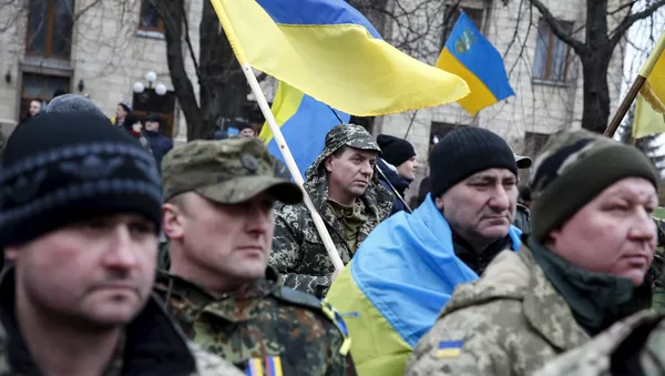 Members of self-defence battalions take part in a rally to commemorate demonstrators who were killed during the EuroMaidan protests in 2014 in Kiev, Ukraine, February 20, 2016. - Sputnik Afrique
