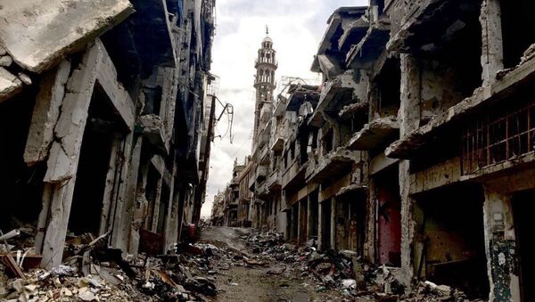 Разрушения в городе Хомс в Сирии - Sputnik Afrique