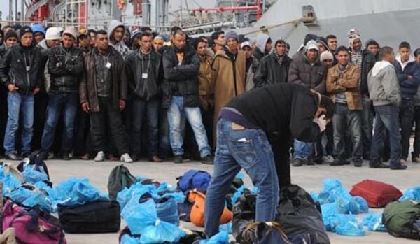 Plus de 700 réfugiés ont débarqué dans l’île italienne de Lampedusa - Sputnik Afrique