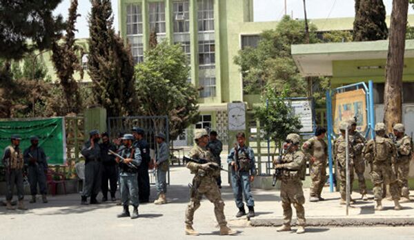 Les troupes de l'Otan ont commencé le transfert du contrôle de sécurité en Afghanistan à la police locale - Sputnik Afrique