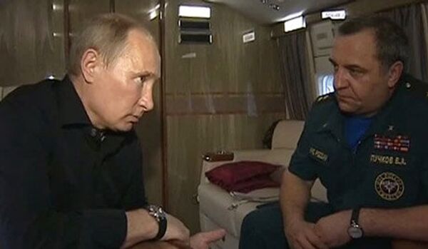Poutine propose aux résidents de Krymsk d'évaluer les dommages avec la commission de la ville - Sputnik Afrique