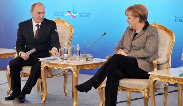 Mme Merkel et M. Poutine au dialogue à Saint-Pétersbourg - Sputnik Afrique