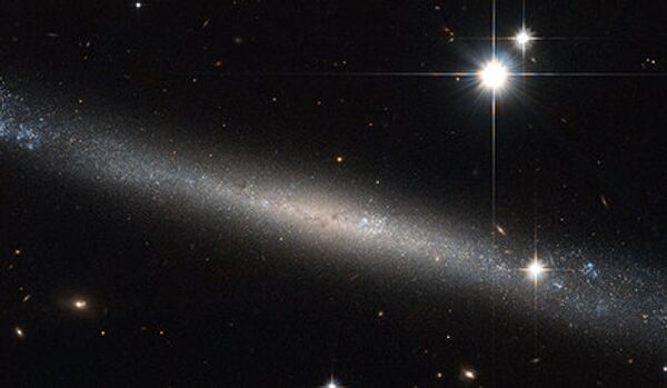 Hubble a pris l’image d’une galaxie ultra-fine en forme de spirale - Sputnik Afrique