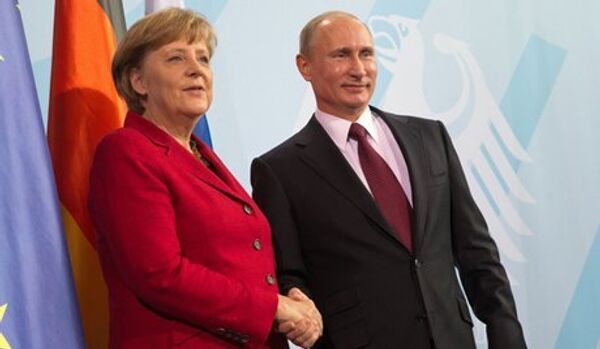Le président Poutine est prêt à débattre avec Merkel - Sputnik Afrique