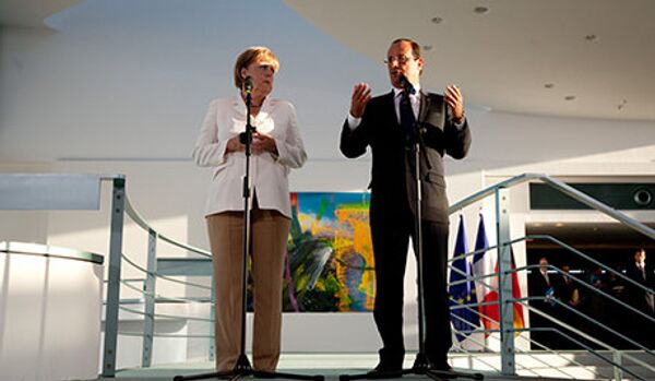 Angela Merkel se trompe de François... et évoque Mitterrand - Sputnik Afrique